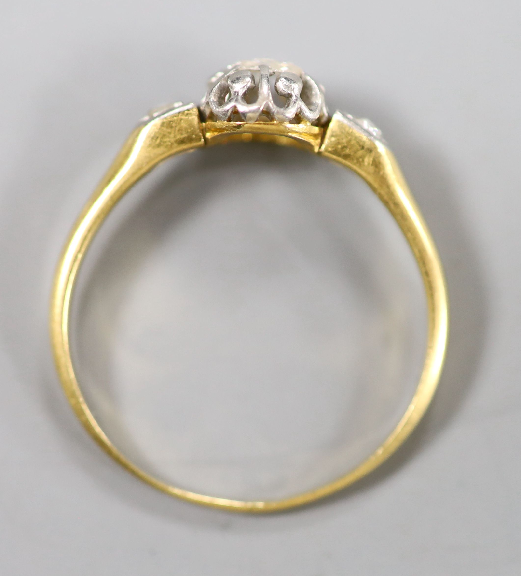 A yellow metal and single stone rose cut diamond set ring, with diamond set shoulders, size Q/R, gross 2.4 grams.